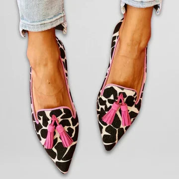Cow Print Pointed Toe Tassel Flats