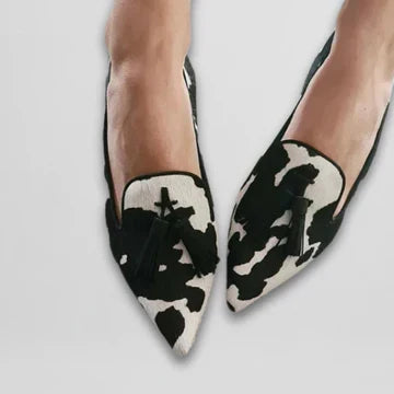Cow Print Pointed Toe Tassel Flats