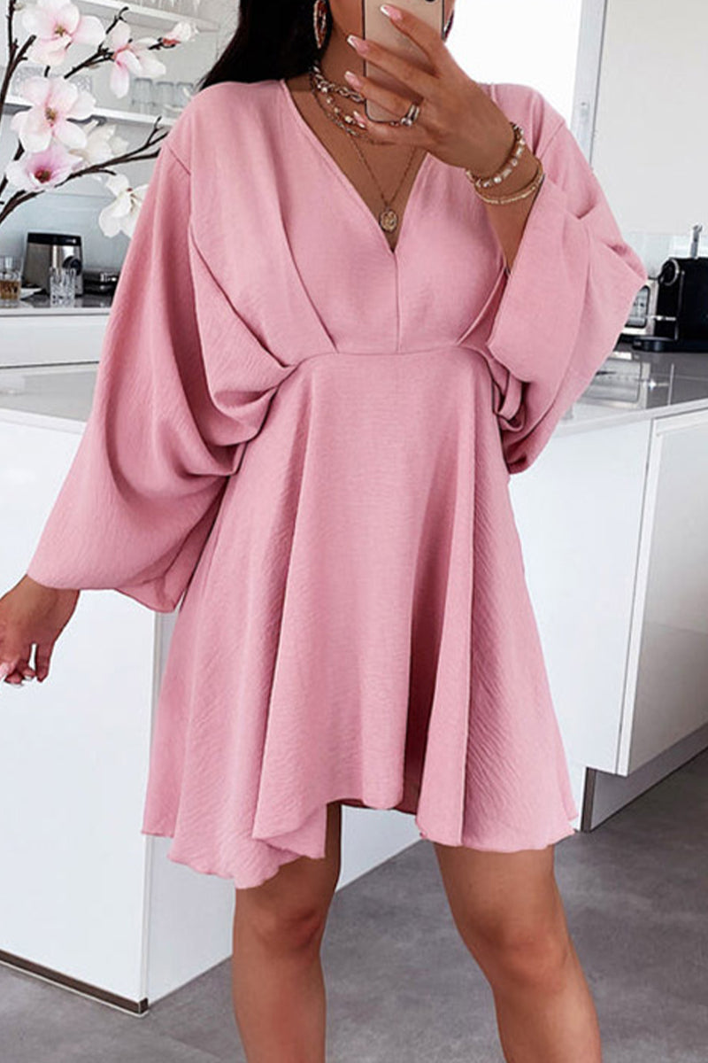 Pamela Chic Long Sleeved Dress with an Asymmetrical V Neck and Irregular Cut Evening Wear Edit