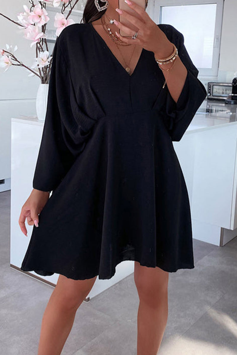 Pamela Chic Long Sleeved Dress with an Asymmetrical V Neck and Irregular Cut Evening Wear Edit