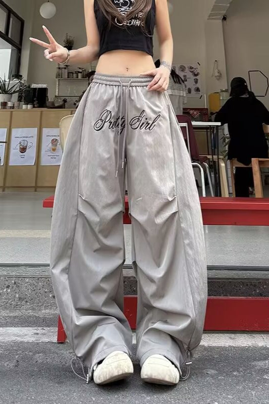 Script Embroidered Drawstring Waist Toggle Hem Baggy Parachute Pants