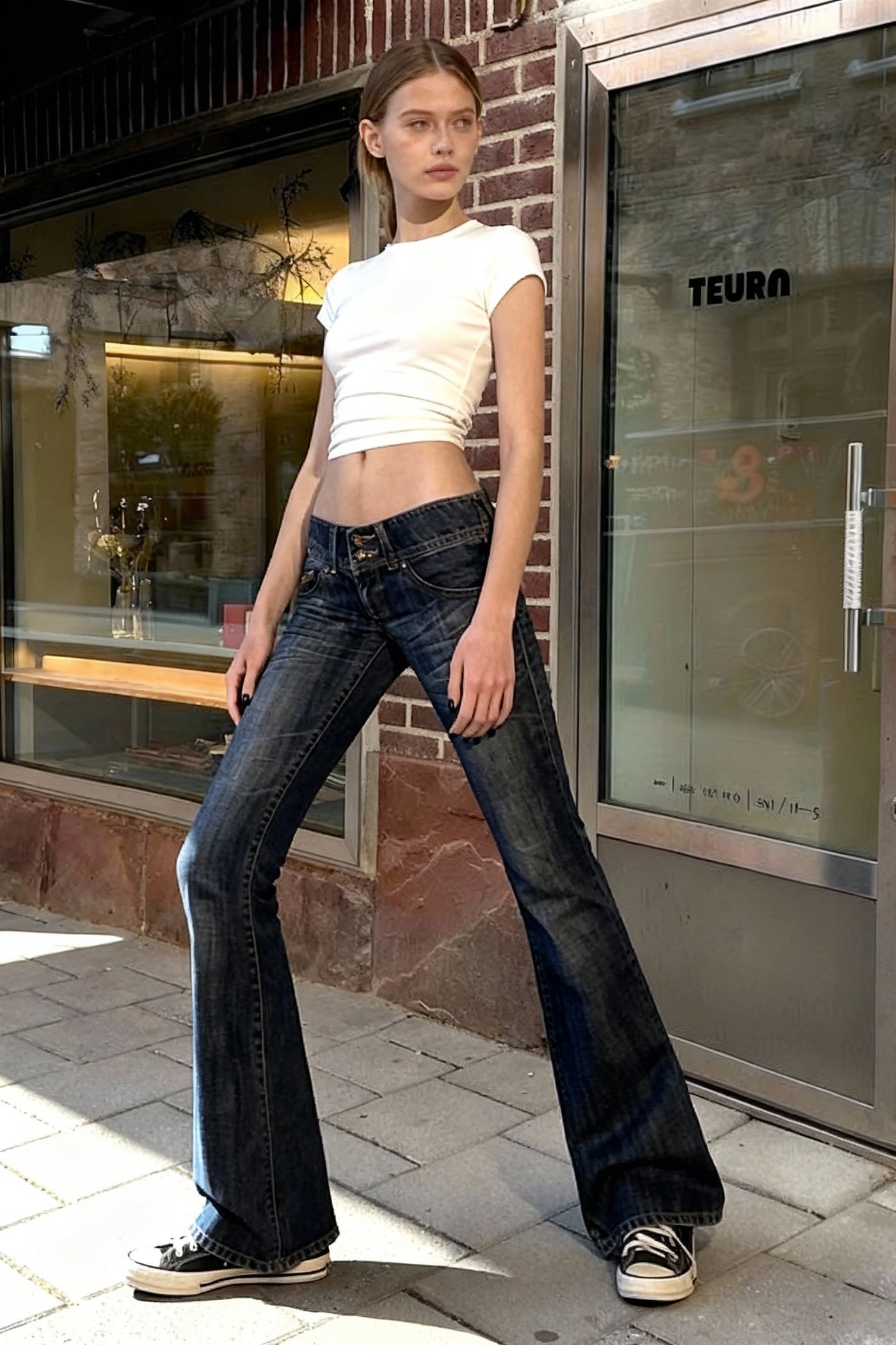 Low Waisted Washed Slim Flared Leg Jeans