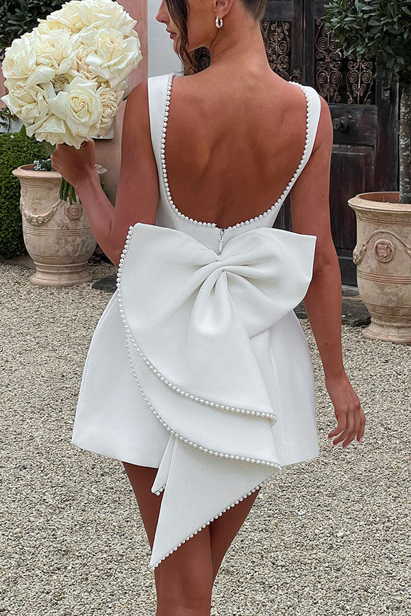 Beaded Boat Neck Pearl Trim Bow Back Sleeveless Fit and Flare Mini Dress