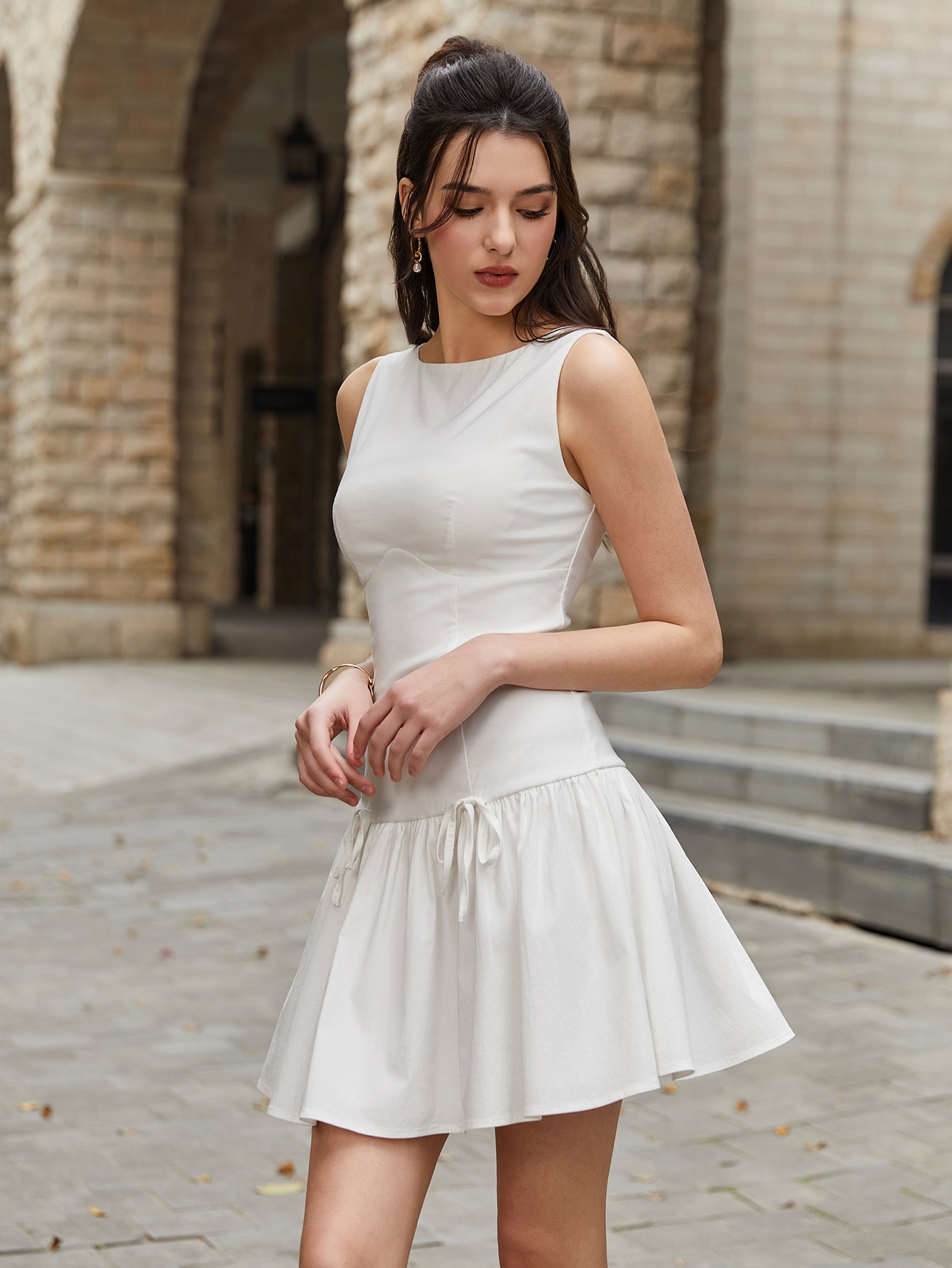 Boat Neck Sleeveless Drop Waist Bow Tie Pleated Mini Dress