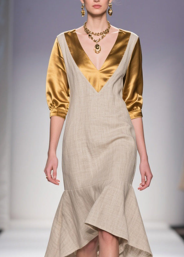 Deep V-Neck Metallic Puff Sleeve Woven Asymmetrical Ruffle Hem Midi Dress