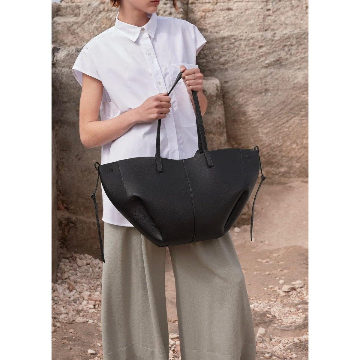 Winged Slouch Faux Leather Tote Bag