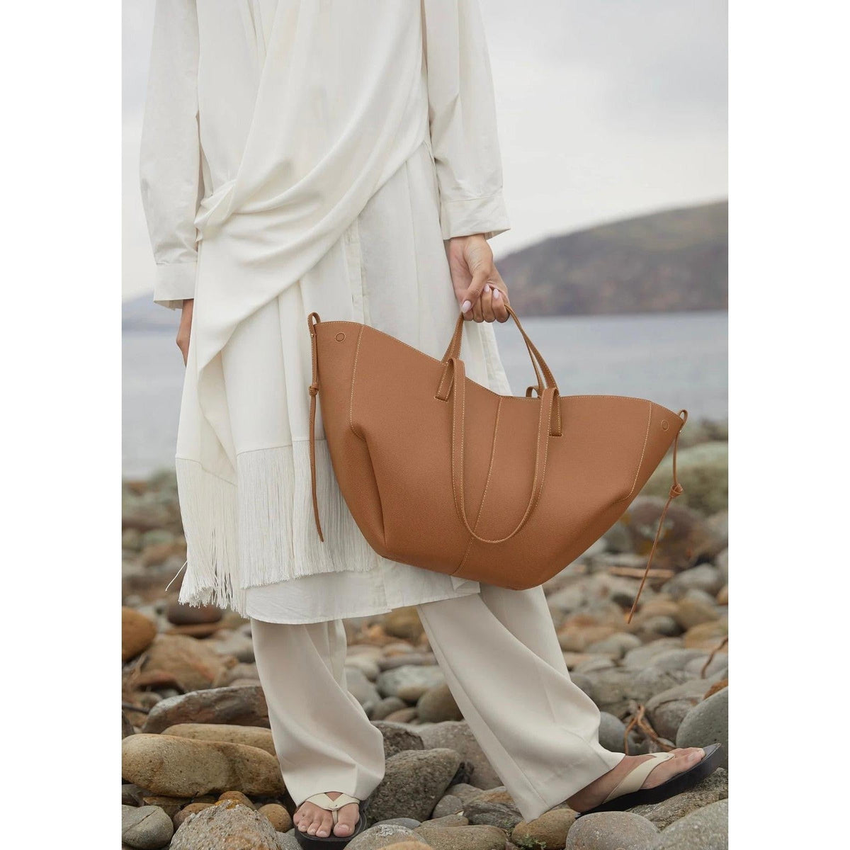Winged Slouch Faux Leather Tote Bag