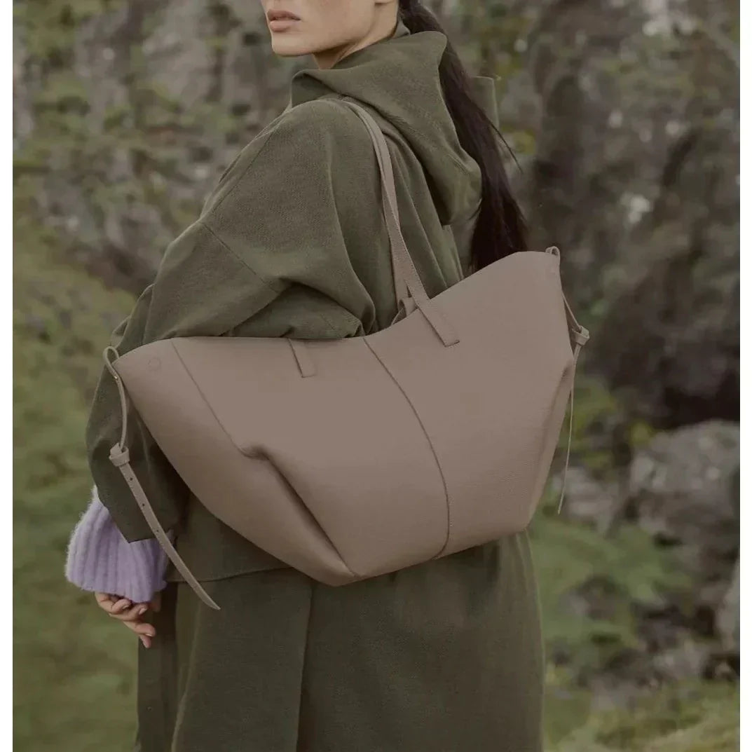 Winged Slouch Faux Leather Tote Bag