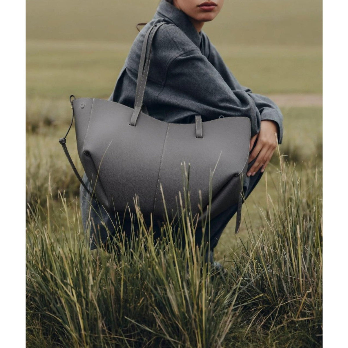 Winged Slouch Faux Leather Tote Bag