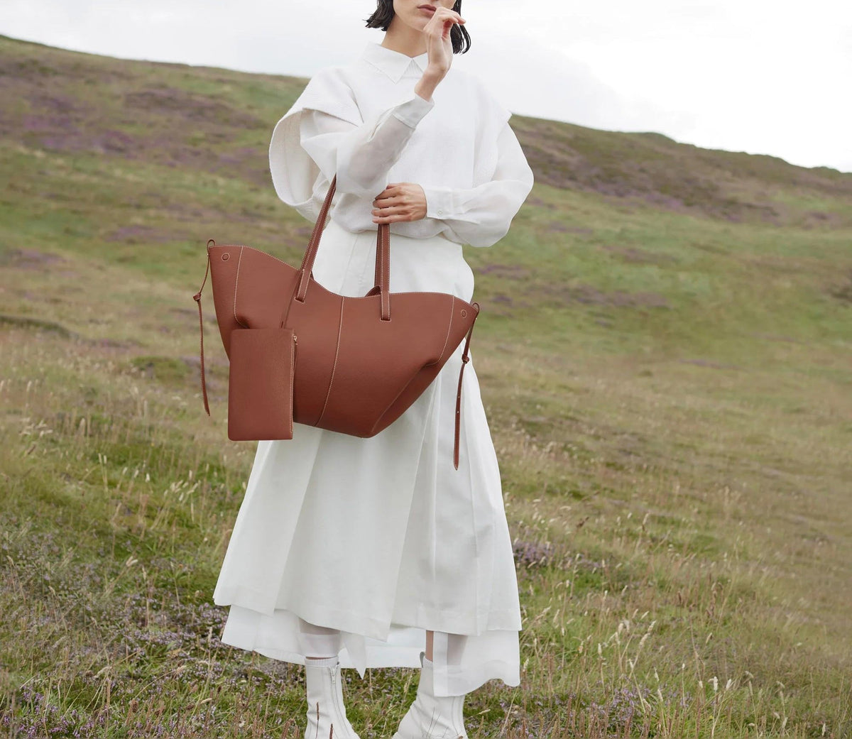 Winged Slouch Faux Leather Tote Bag