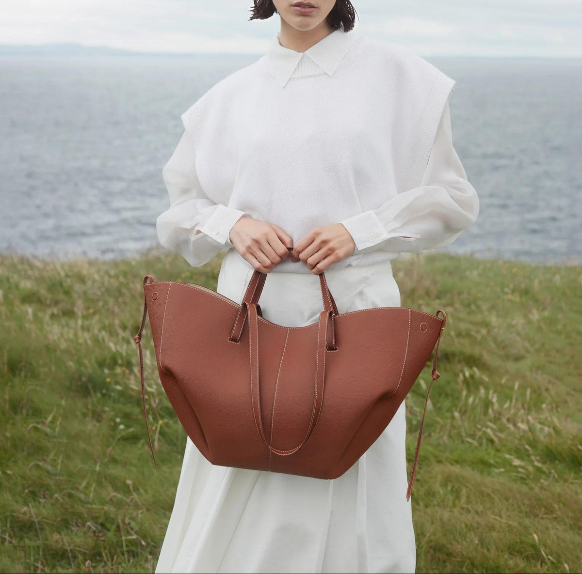 Winged Slouch Faux Leather Tote Bag