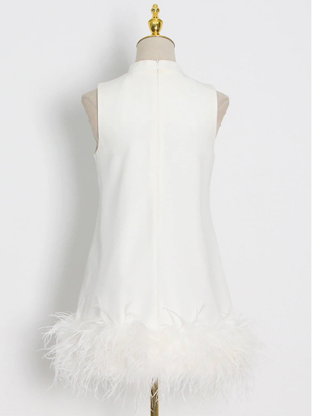 Sleeveless High Neck Feather Hem Shift Mini Dress