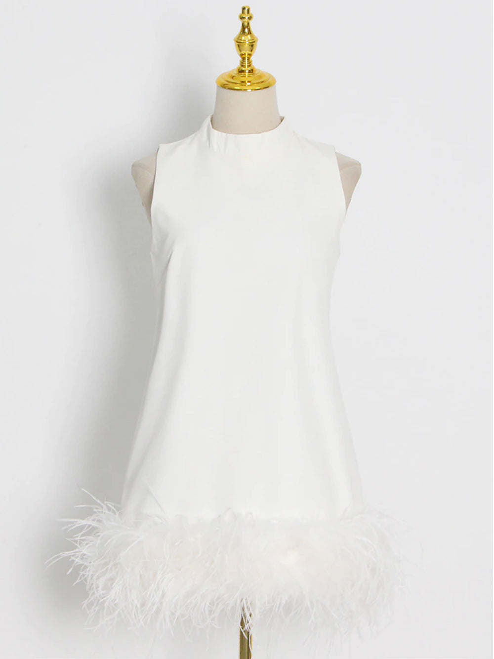 Sleeveless High Neck Feather Hem Shift Mini Dress