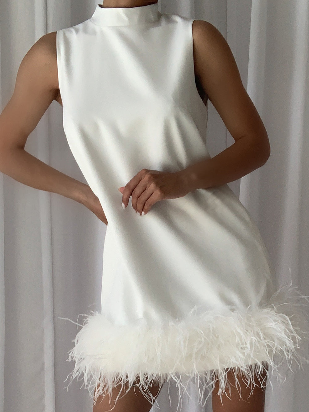 Sleeveless High Neck Feather Hem Shift Mini Dress