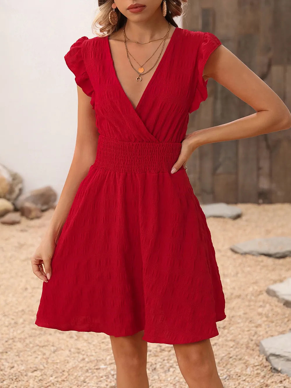 Textured Surplice V-Neck Flutter Sleeve Smocked Waist Mini Dress