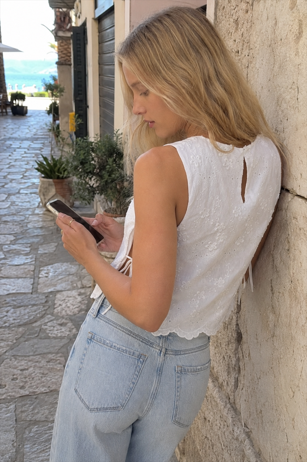 Solid Embroidered Sleeveless Round Neck Crop Top