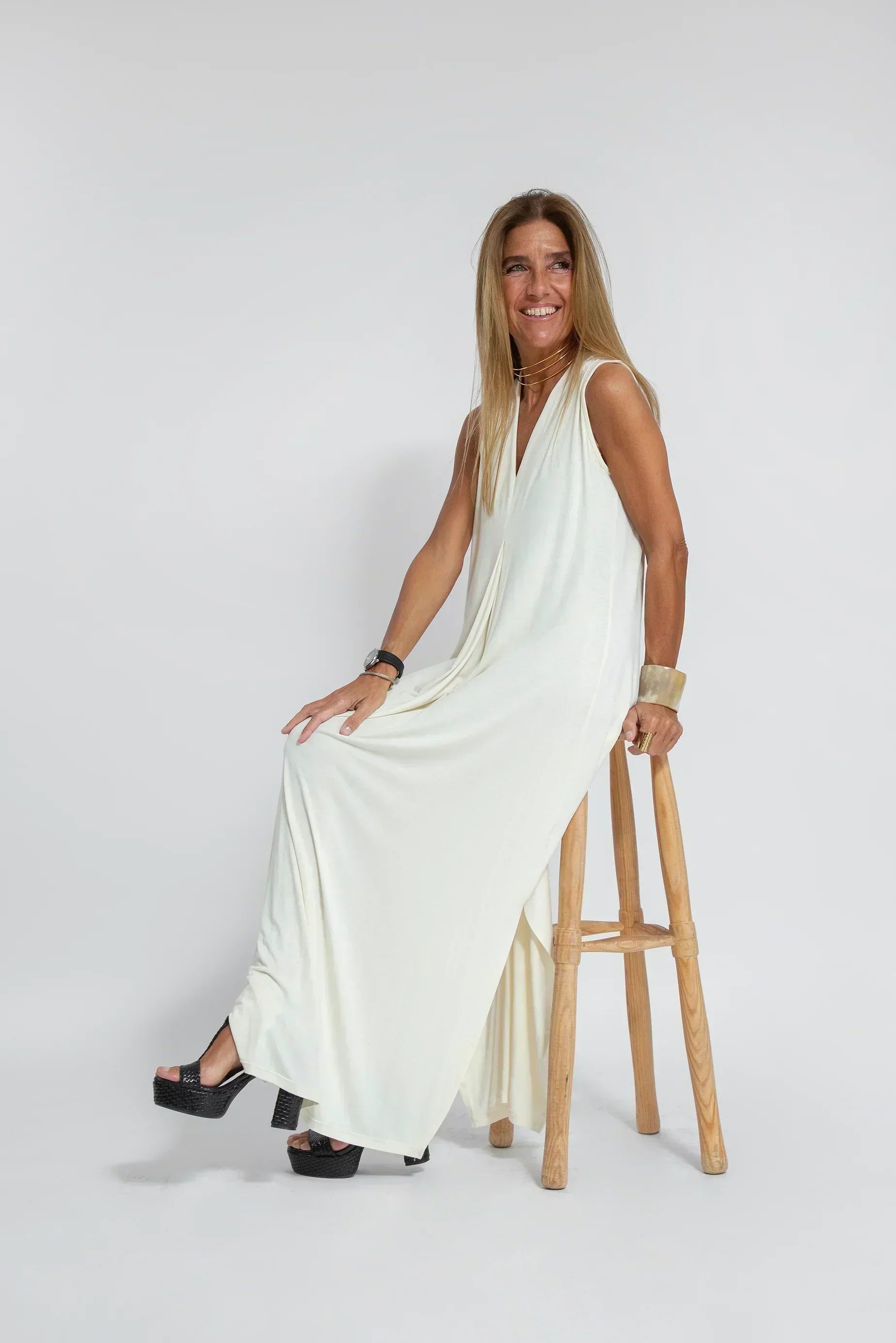 Deep V-Neck Sleeveless Center Pleat Flowy Maxi Dress