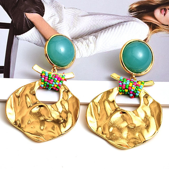 Beating The Odds Drop Dangle Earrings