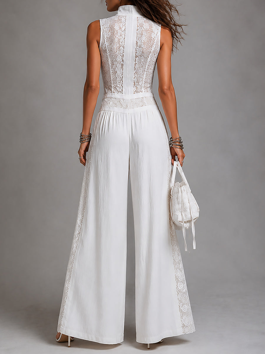 Vintage jumpsuit with a high collar and wide legs, featuring lace panels