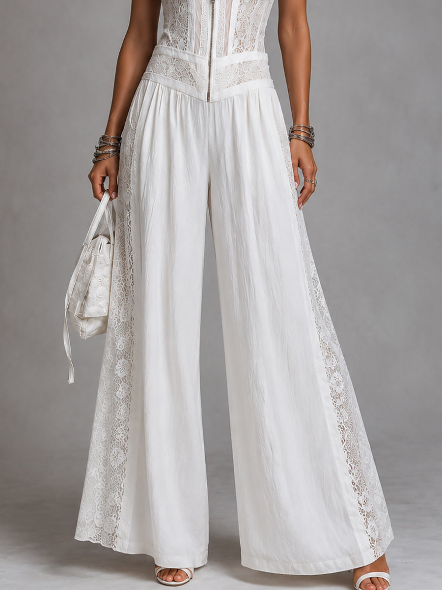 Vintage jumpsuit with a high collar and wide legs, featuring lace panels