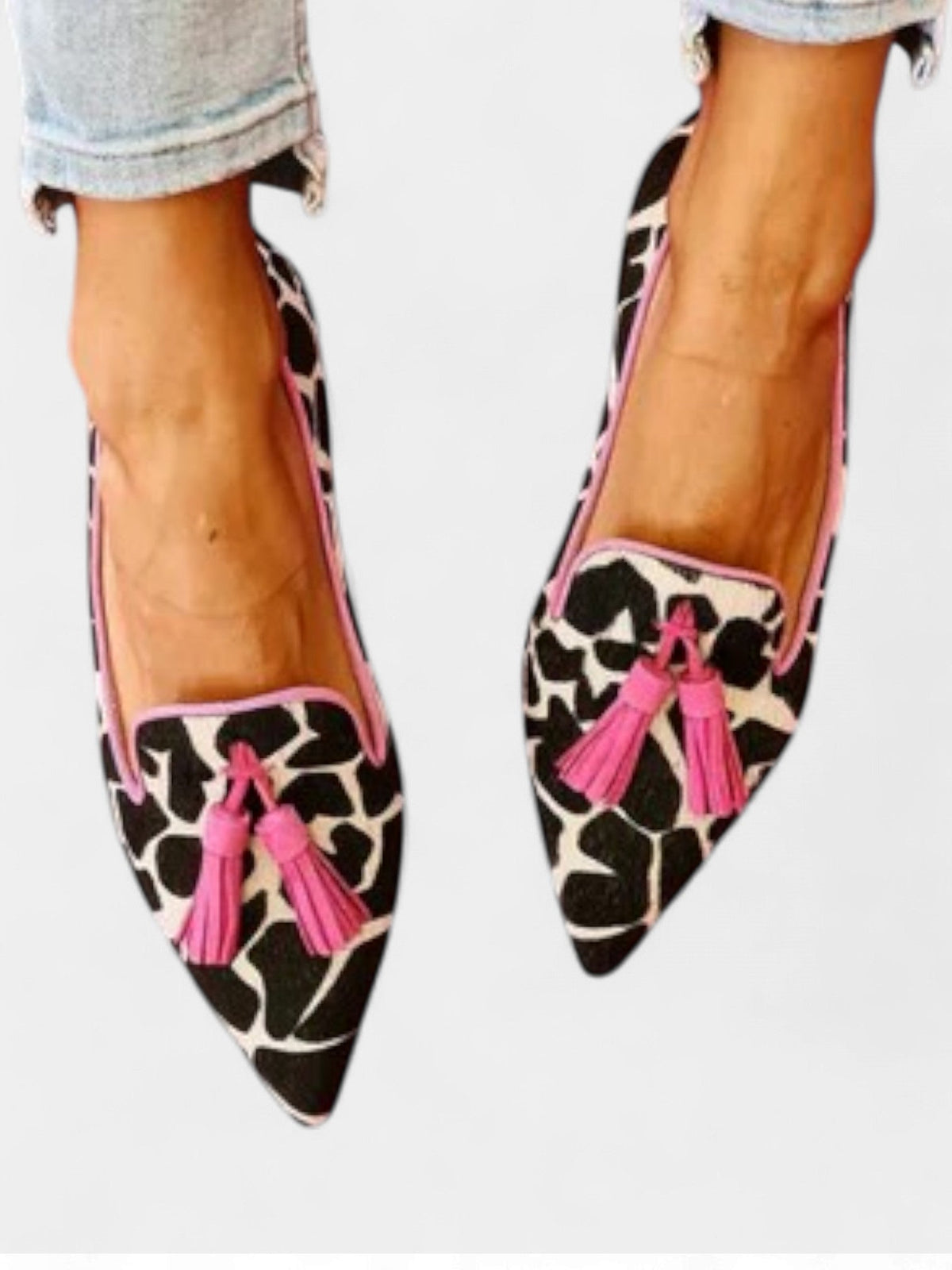Cow Print Pointed Toe Tassel Flats