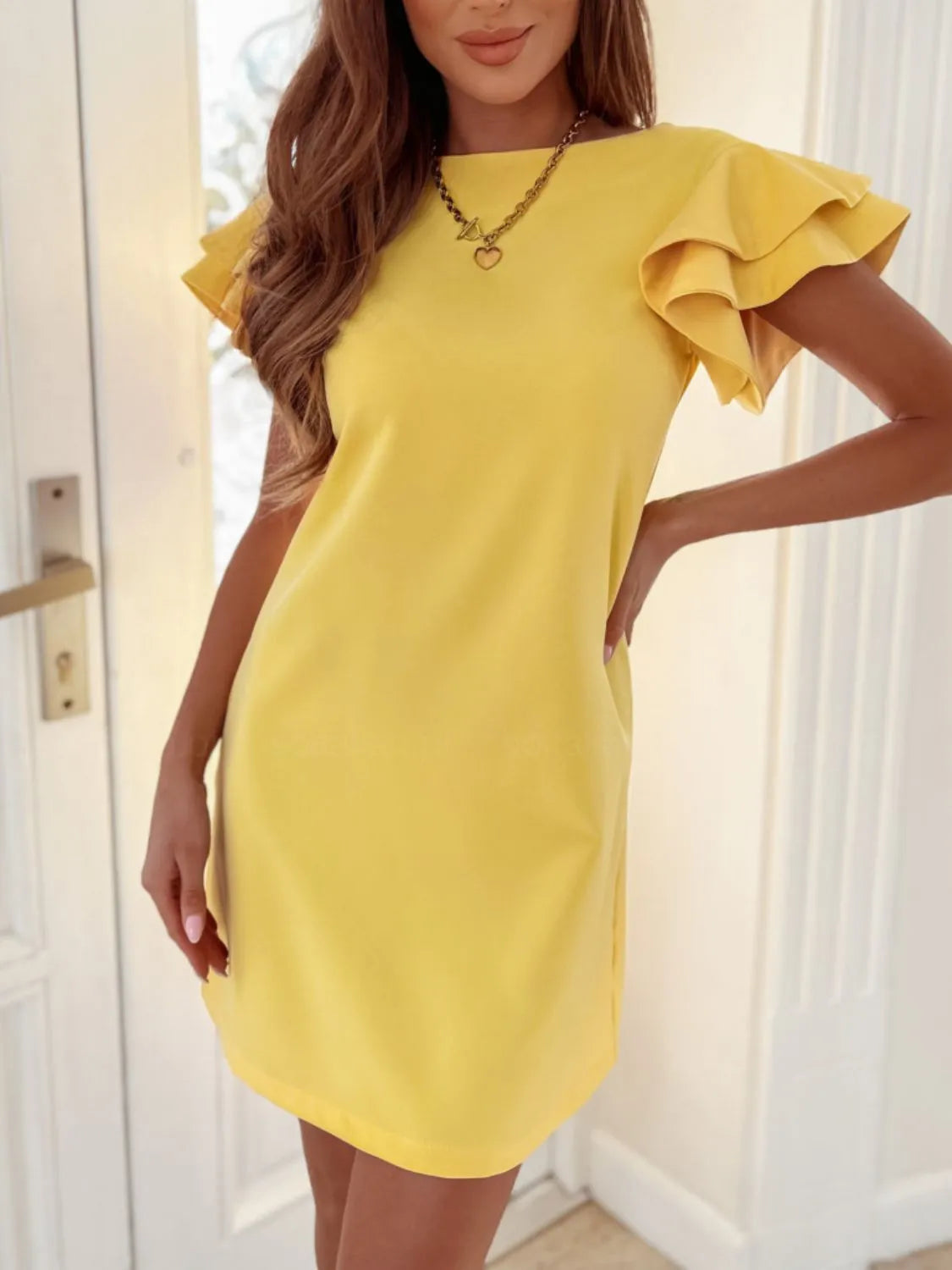 Claire Exclusive Short Sleeved Mini Dress with Ruffled Cape Boutique Collection
