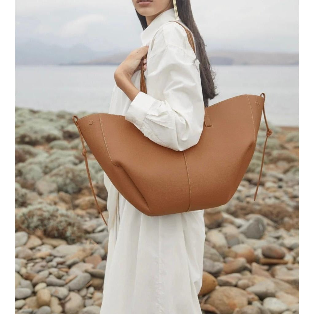 Winged Slouch Faux Leather Tote Bag