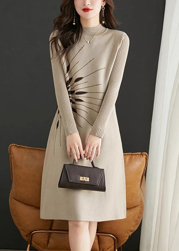 Ribbed Knit Mock Neck Long Sleeve Radiating Graphic A-Line Midi Dress