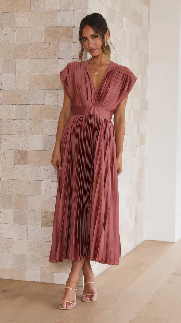 Olivia Statement Long Dress with Deep V Neckline and Bow On the Back Boutique Collection