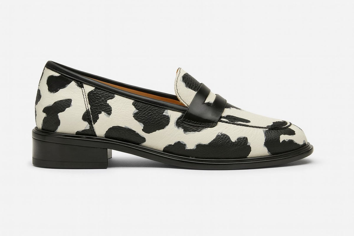 Cow Print Buckle Strap Loafers