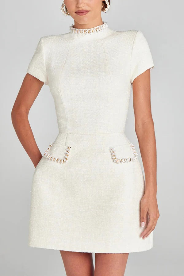 Leslie Timeless Exquisite and Playful Mini Dress Made of Tweed Fabric with Beaded Trim, Short Sleeves and Pockets Elevated Occasion Wear