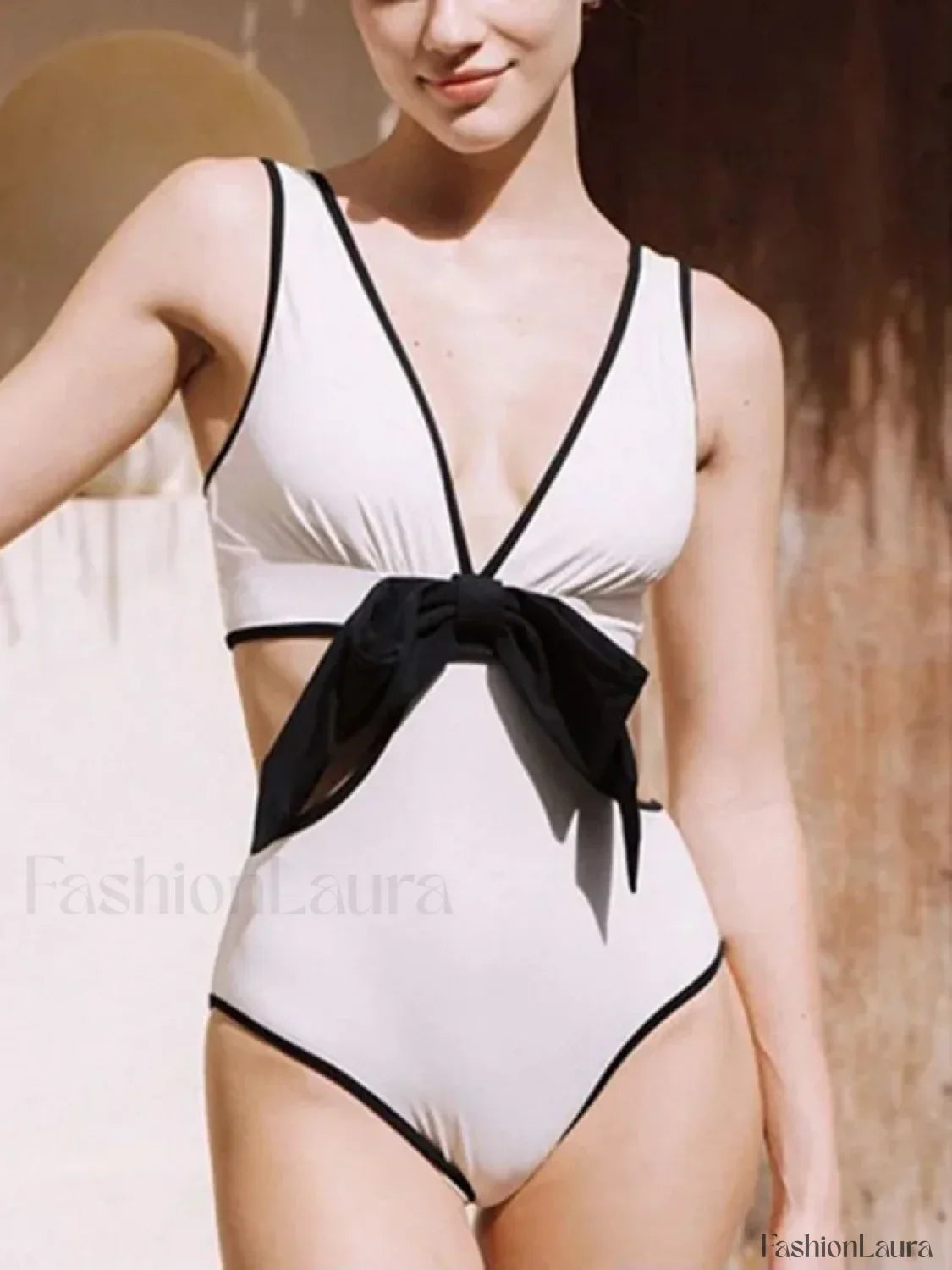 Deep V-Neck Hollow Out Bow One Piece