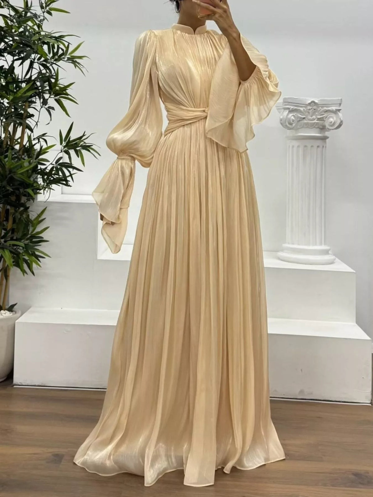 Pleated Satin Mock Neck Flared Bell Sleeve Twist Waist Maxi Gown