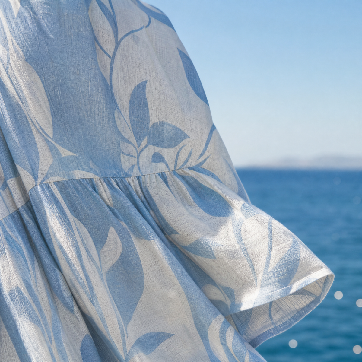 Solene | Sleeveless Blue Leaf Pattern Midi Dress