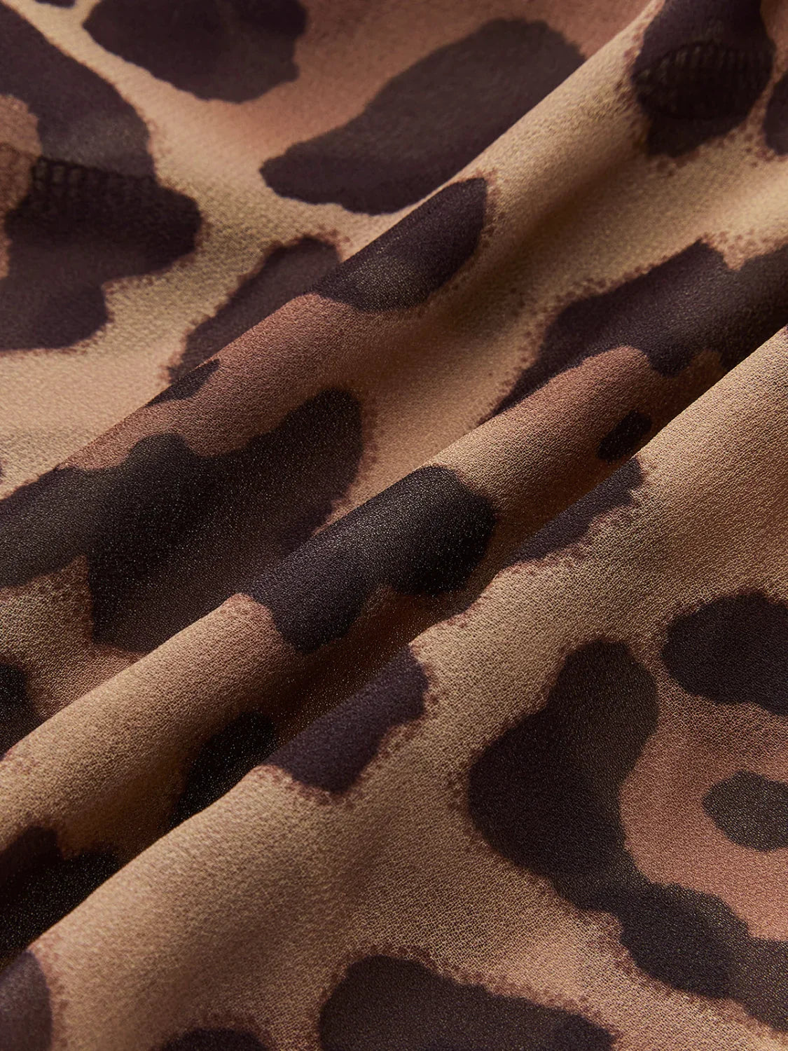 Leopard Print Semi-Sheer Ruffle V-Neck Blouse