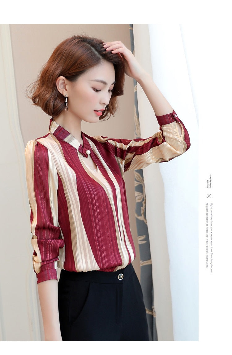 Turning Tables Stripped V-Neck Blouse