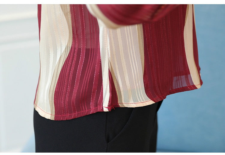 Turning Tables Stripped V-Neck Blouse