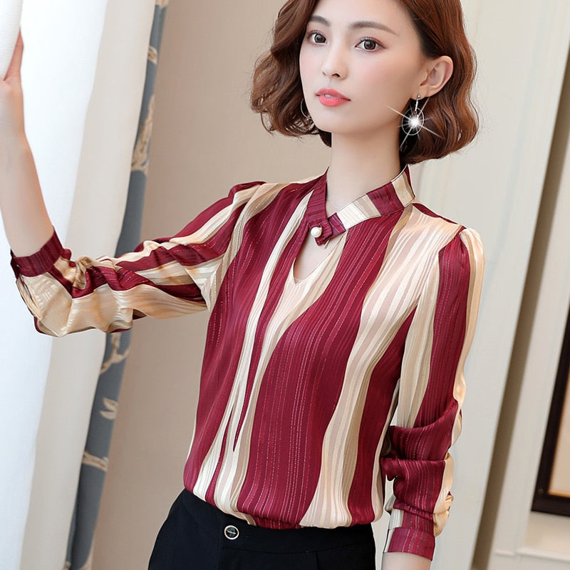 Turning Tables Stripped V-Neck Blouse